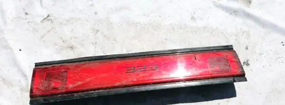 Mazda 323 F Trunk door license plate light bar 42261301 422-61301