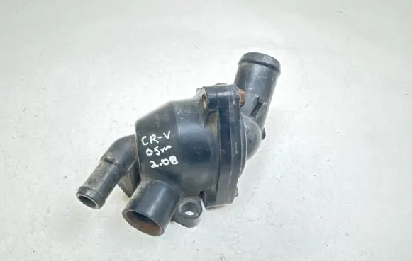 Thermostat/thermostat housing