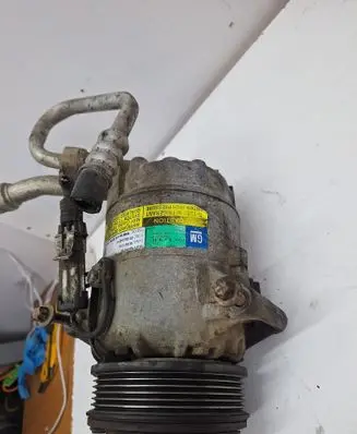 Opel Zafira B Air conditioning (A/C) compressor (pump) 13124752