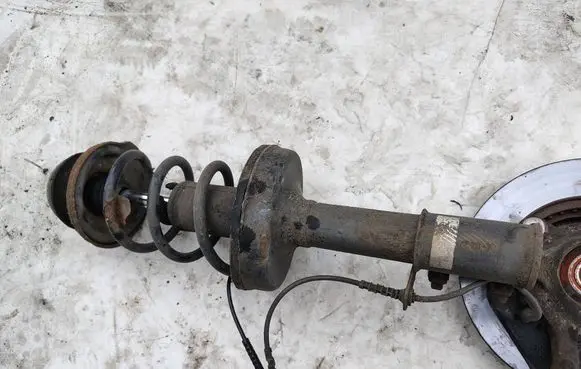 Renault Twingo II Front shock absorber with coil spring 