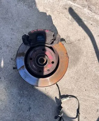 Front wheel hub spindle knuckle