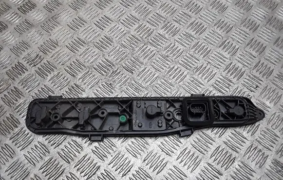 Tail light bulb cover holder