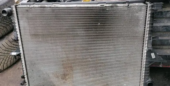 Volkswagen Touareg I Coolant radiator 7L6121253C