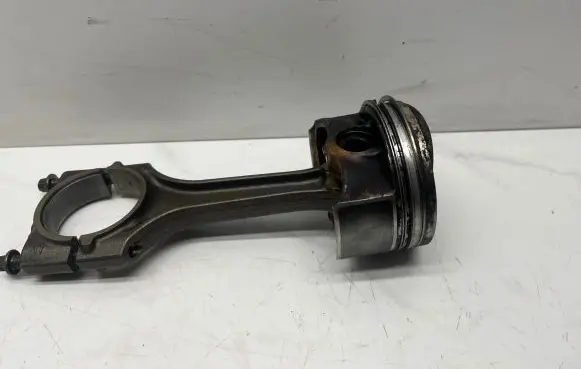 Piston with connecting rod