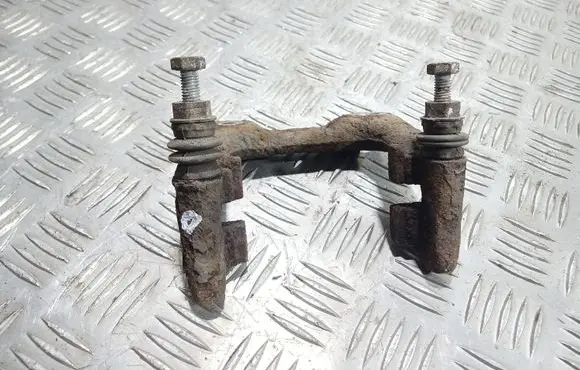 Volkswagen Golf V Brake caliper pad carrier rear 