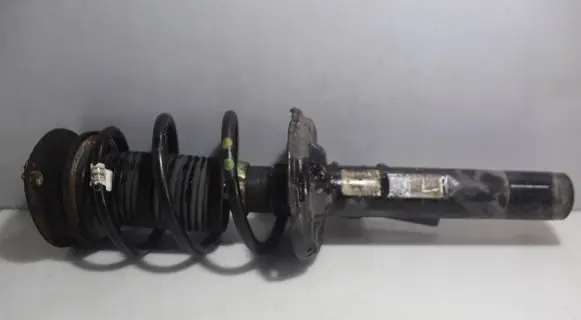 Volkswagen Touran III Front shock absorber with coil spring