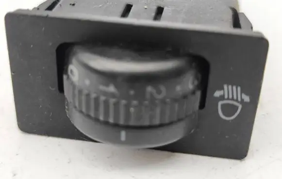 Headlight level height control switch