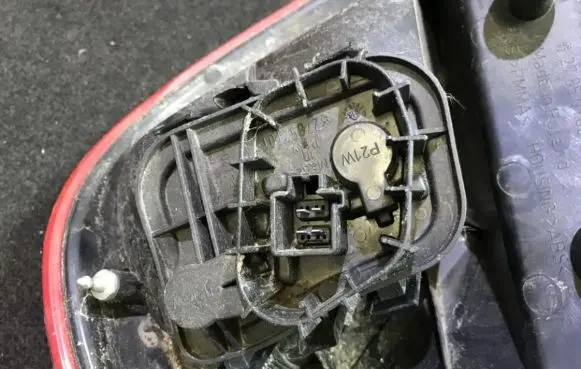 Mitsubishi Colt Tail light bulb cover holder 27852101