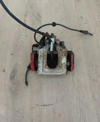 Volkswagen Touareg I Rear brake caliper 