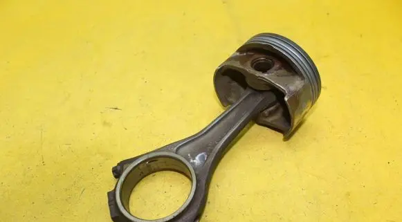 Piston with connecting rod