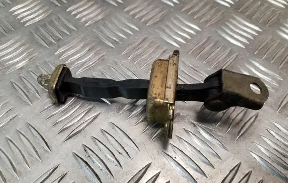 Nissan Primera Front door check strap stopper