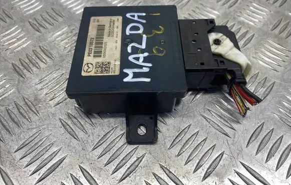 Mazda 2 Voltage converter/converter module PE0318572 0304382625