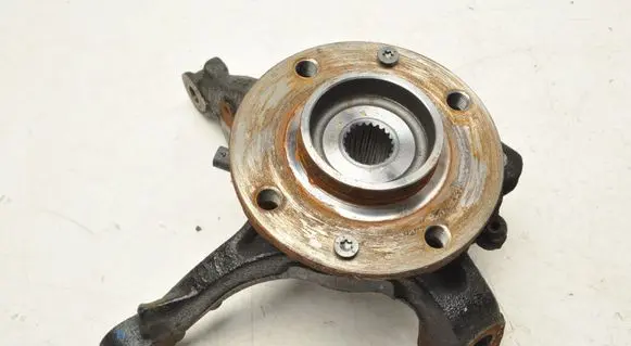Opel Corsa F Front wheel hub spindle knuckle 9824439980