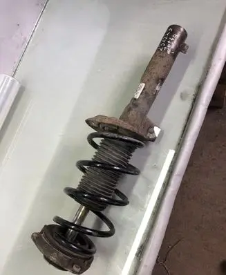 Volkswagen Jetta VI Front shock absorber with coil spring 5C0413031