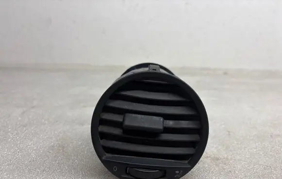 Volkswagen Caddy Dash center air vent grill 2K0819703B