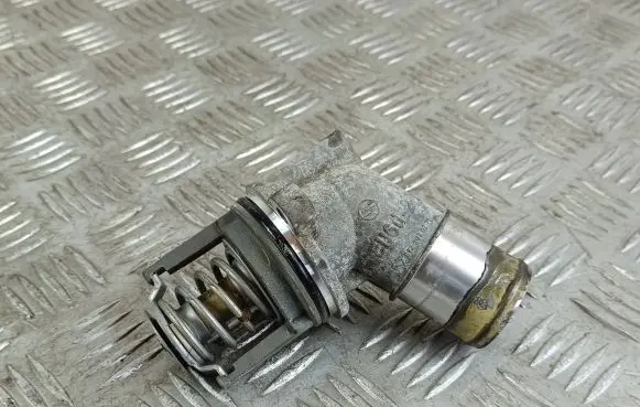 Thermostat/thermostat housing
