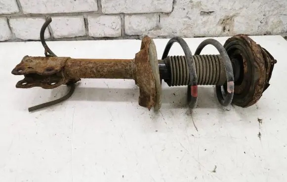 Nissan X-Trail T30 Front shock absorber with coil spring