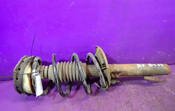 Front shock absorber with coil spring