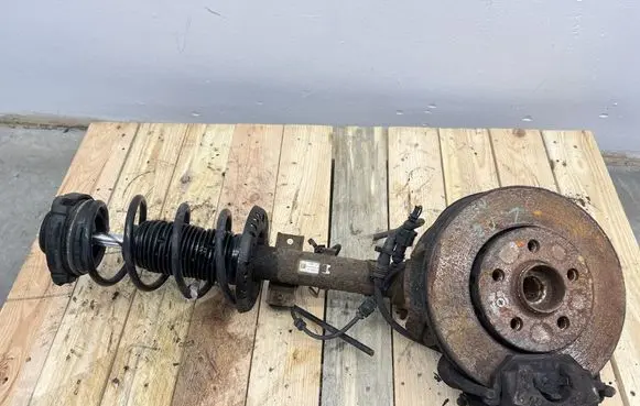 Audi A2 Front shock absorber with coil spring 
