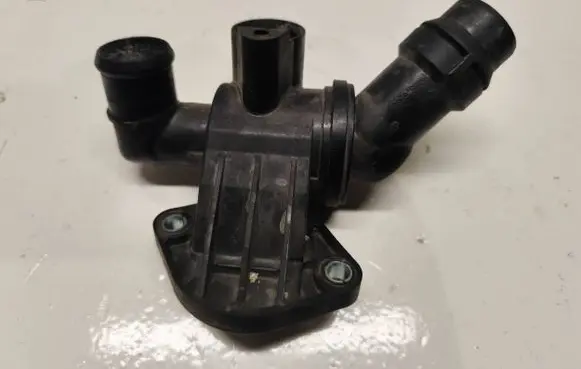 Thermostat/thermostat housing