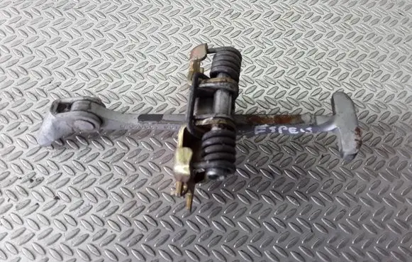 Rear door check strap stopper
