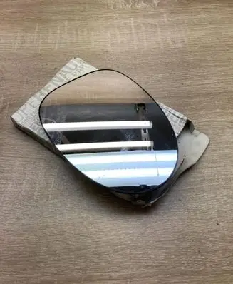 Renault Twingo I Wing mirror glass 7701049083