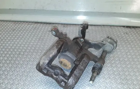 Opel Astra J Rear brake caliper
