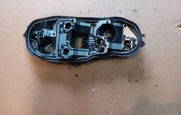 Opel Corsa D Tail light bulb cover holder 89037852A