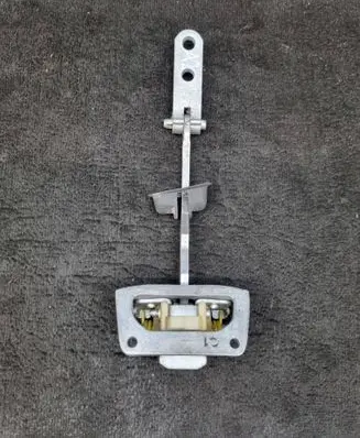 Rear door check strap stopper
