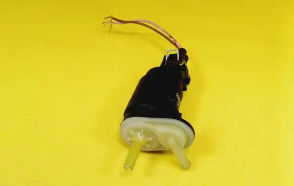 Nissan Primera Windscreen/windshield washer pump 20859