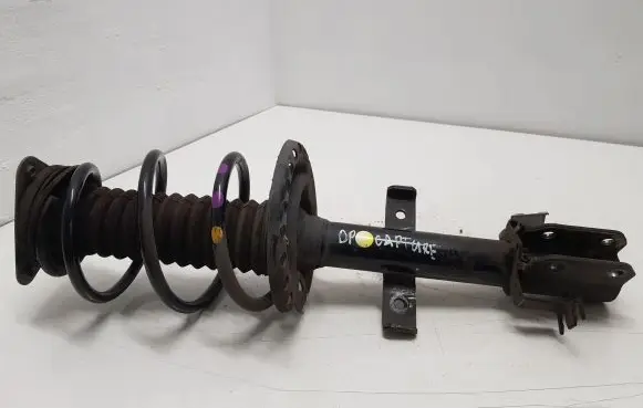 Front shock absorber with coil spring