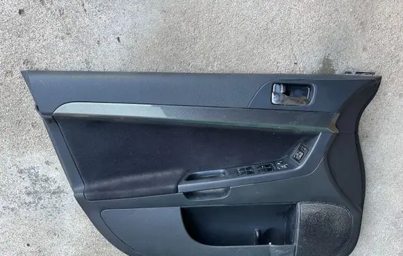 Mitsubishi Lancer Evolution Front door card panel trim