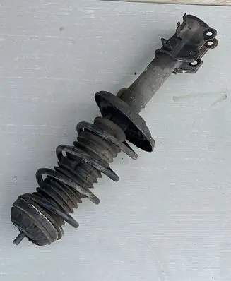 Opel Corsa D Front shock absorber with coil spring