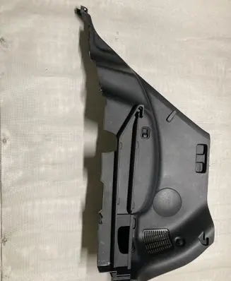 Trunk/boot lower side trim panel