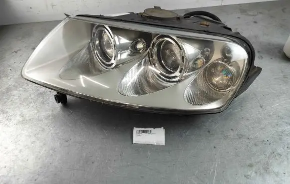 Volkswagen Touareg I Headlight/headlamp 89027363