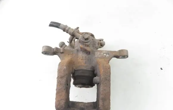 Opel Astra J Rear brake caliper 