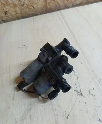 Coolant heater control valve