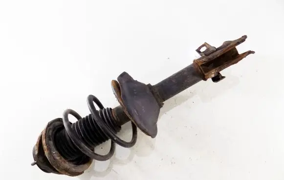 Subaru Forester SF Front shock absorber with coil spring