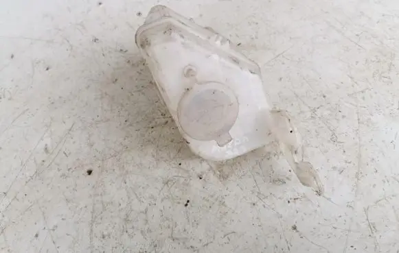 Mazda 323 Windshield washer fluid reservoir/tank 860142058