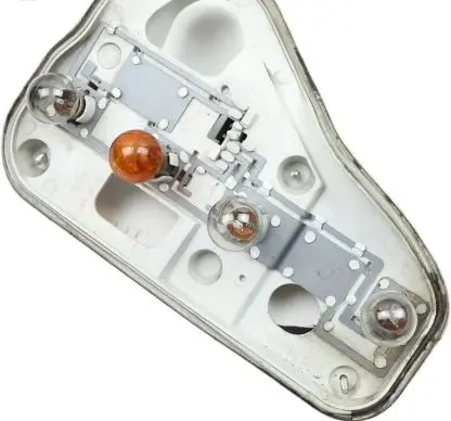 Tail light bulb cover holder