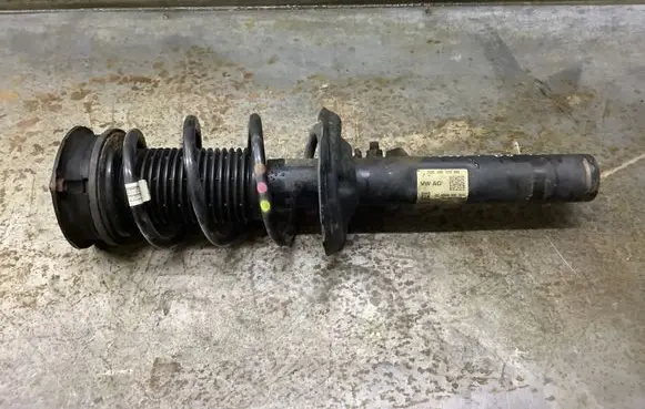 Volkswagen PASSAT B8 Front shock absorber with coil spring 3Q0413031BN 824904010024