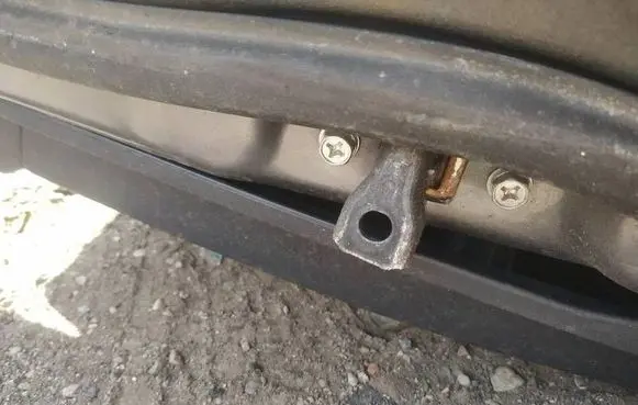 Rear door check strap stopper