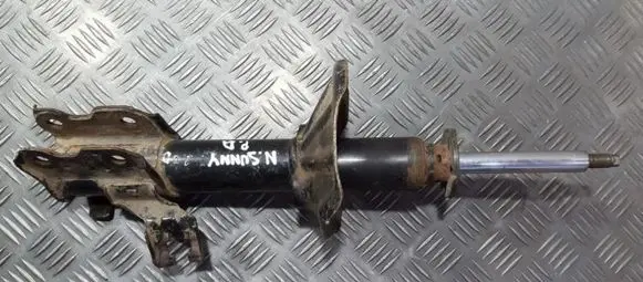 Nissan Sunny Front shock absorber/damper 633115