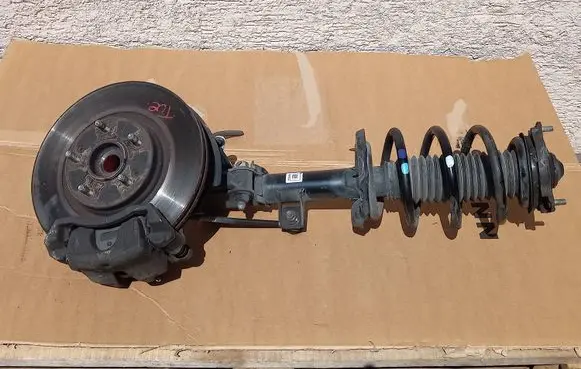 Hyundai Tucson TL Front shock absorber with coil spring 54660D7000