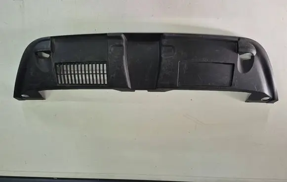 Engine bonnet/hood lock trim molding