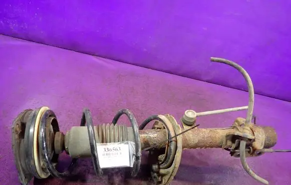 Nissan Micra Front shock absorber with coil spring