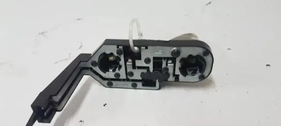 Tail light bulb cover holder