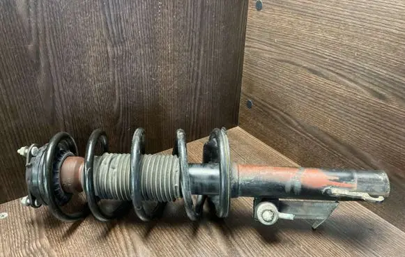 Front shock absorber/damper