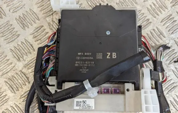 Toyota Corolla E210 E21 Central body control module 89221-02710 82730-02P80-A