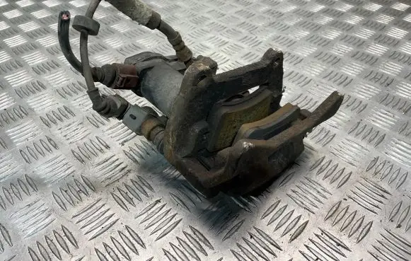 Audi A7 S7 4G Rear brake caliper 32337647